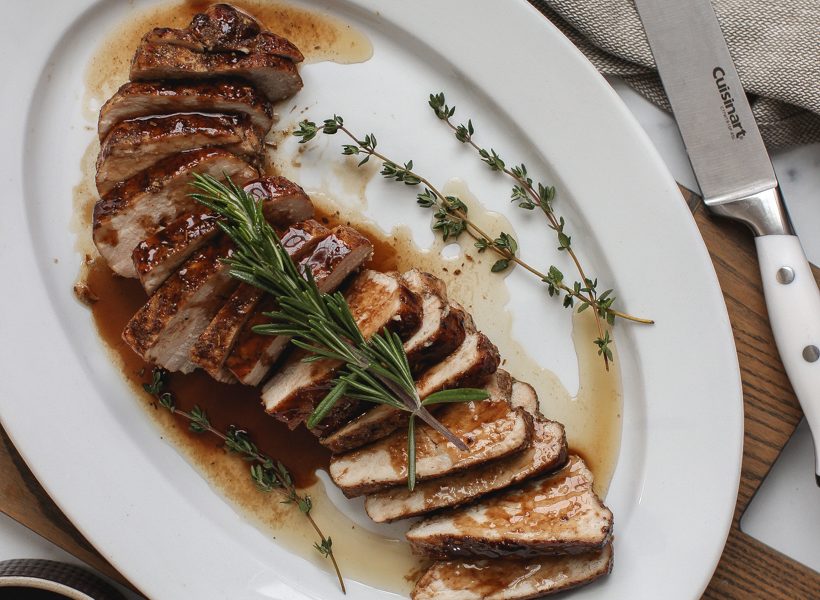 Easy oven roasted pork tenderloin topped with the most delicious balsamic glaze