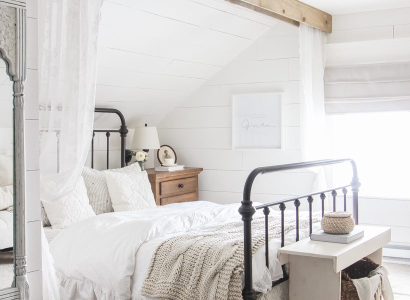 Step inside home and lifestyle blogger Liz Fourez's charming master bedroom with gorgeous farmhouse details and neutral color palette.