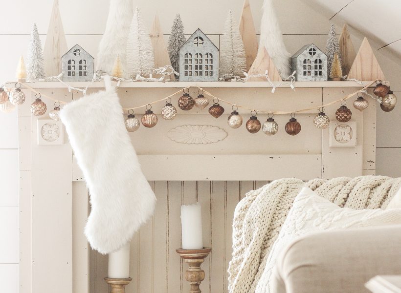 Interior decorator and home blogger Liz Fourez shares her beautiful mantel decorated for Christmas. Find out how you can build this exact mantel on LoveGrowsWild.com