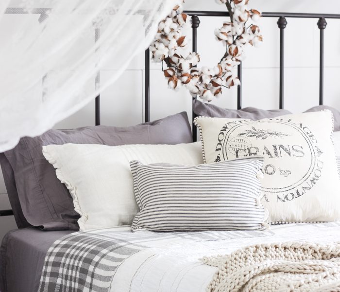 A beautiful farmhouse bedroom decorated with simple touches of fall!