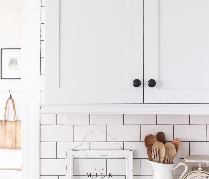 Follow along the makeover of this beautiful farmhouse kitchen! In this post, Liz shares all the finishing touches she picked for lighting, faucets, furniture, and more!