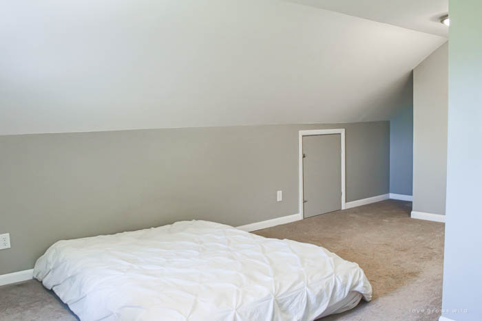 See our plans for transforming this bare, boring attic space into a cozy, farmhouse-style master bedroom! Follow along the with the makeover at LoveGrowsWild.com