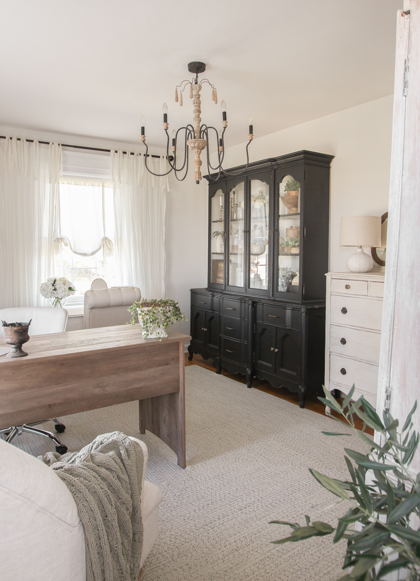 Home blogger and interior decorator Liz Fourez shares her home office that features antique furniture as the perfect storage pieces for her business.