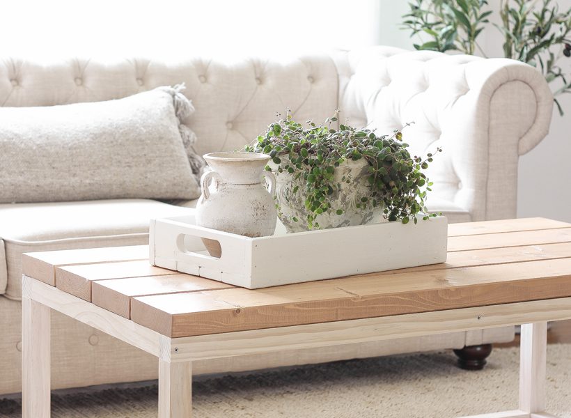 Home and lifestyle blogger Liz Fourez shares the new coffee table she built for her living room with a full tutorial and step-by-step photos. Read this blog post for more details!