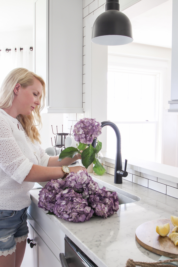 This beautiful, old farmhouse is ready for summer with fresh flowers, relaxed decor, and plenty of sunshine. Come take a tour!