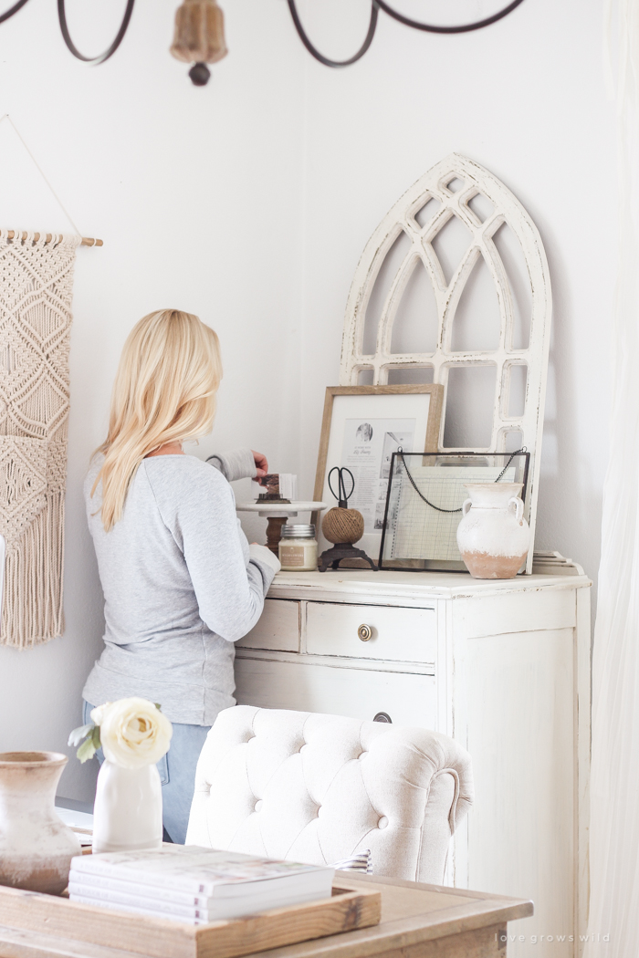 A lovely casual home office with lots of light, soft textures, and gorgeous greenery.