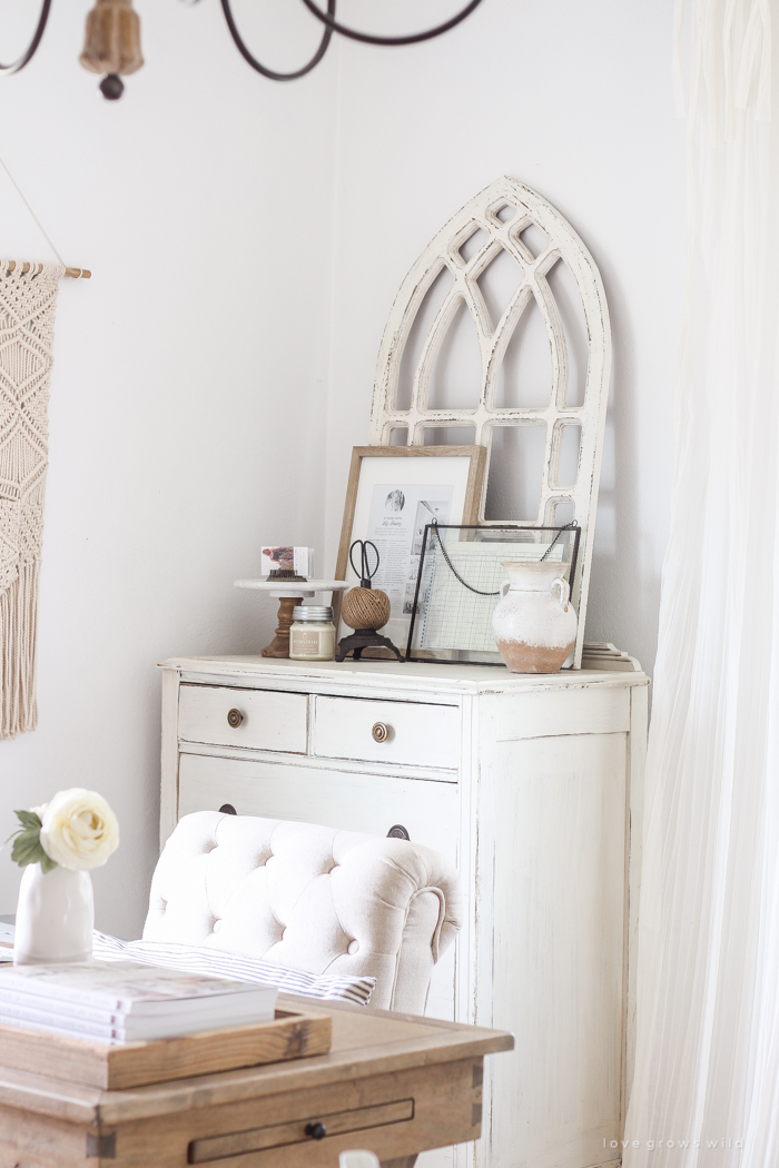 A lovely casual home office with lots of light, soft textures, and gorgeous greenery. 