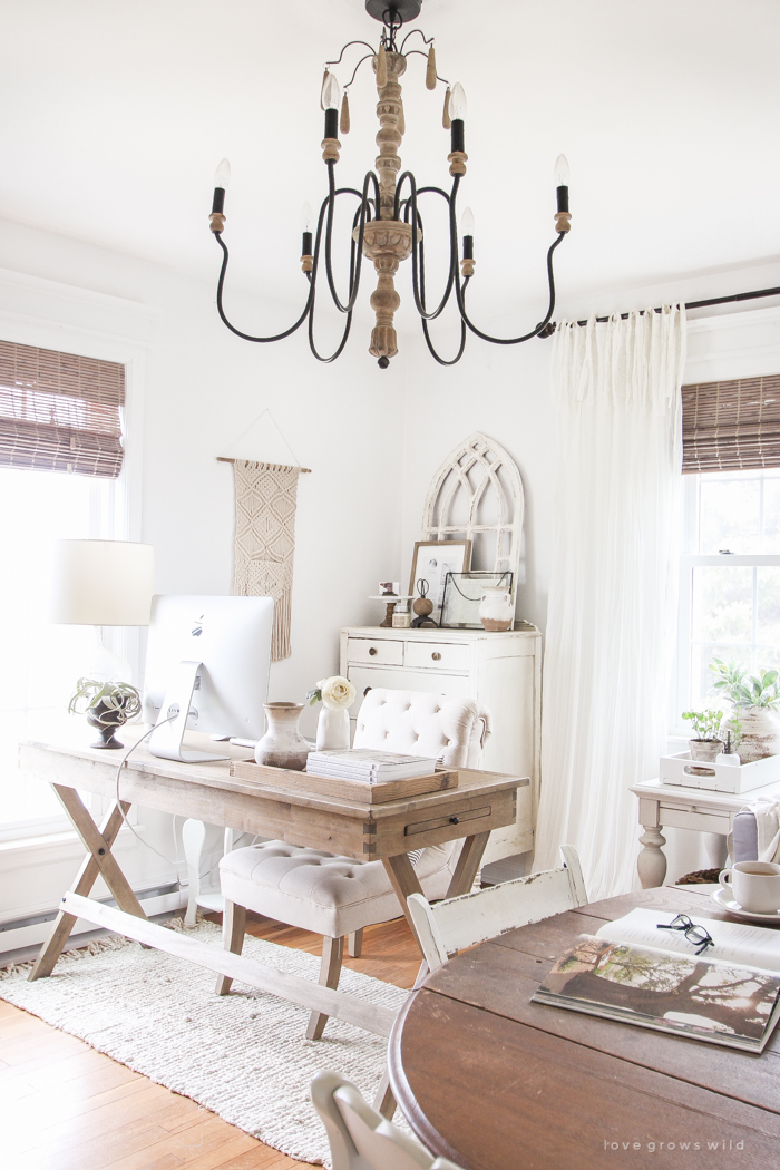 A lovely casual home office with lots of light, soft textures, and gorgeous greenery. 