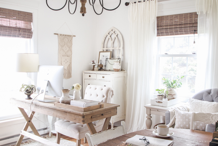 A lovely casual home office with lots of light, soft textures, and gorgeous greenery. 