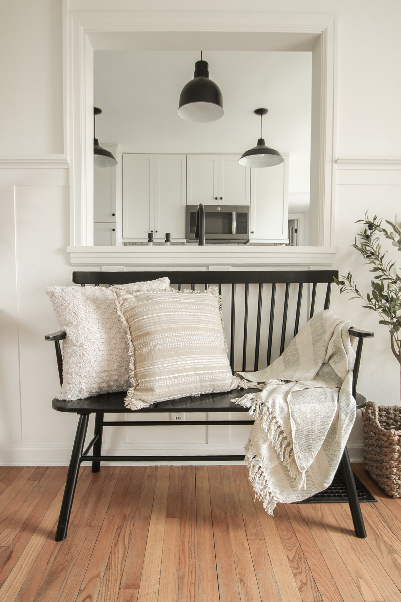 A beautiful neutral entryway shared by home blogger and interior decorator Liz Fourez