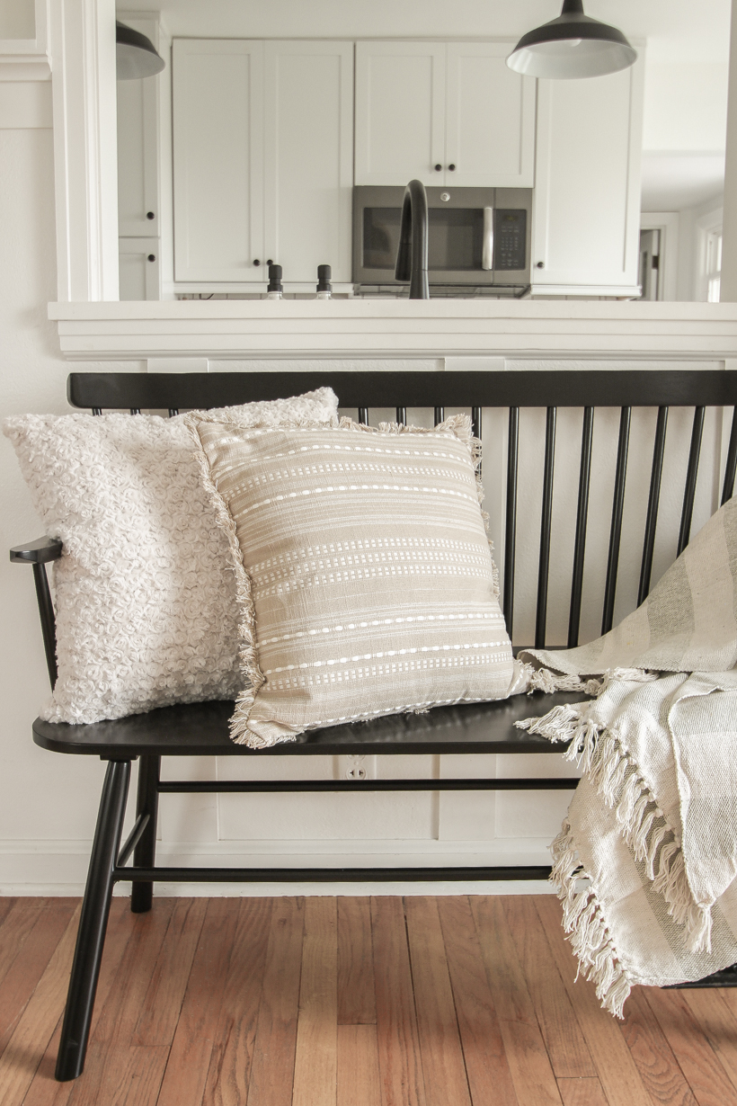 A beautiful neutral entryway shared by home blogger and interior decorator Liz Fourez