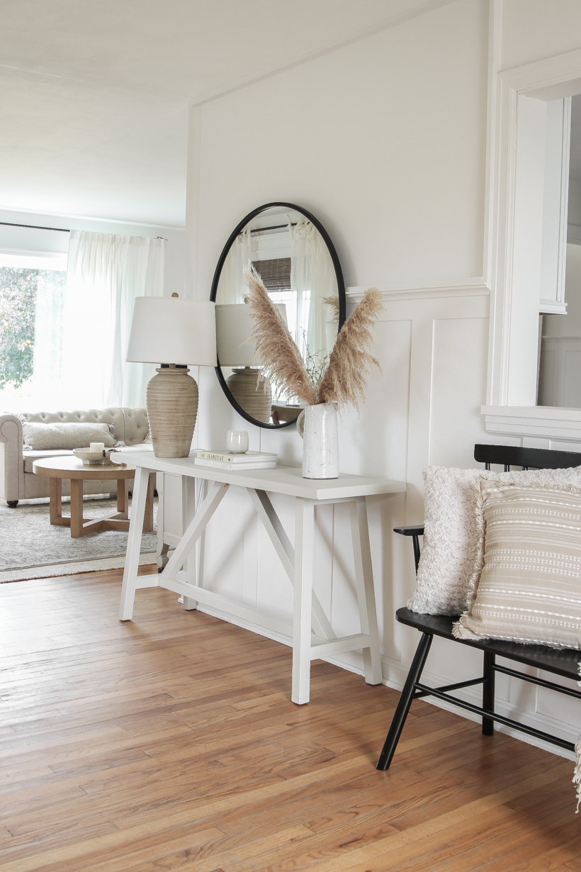 A beautiful neutral entryway shared by home blogger and interior decorator Liz Fourez