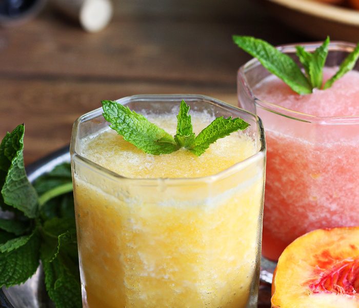 This wine slush is the perfect sip on a hot summer day! Just blend wine and fruit together and freeze into ice cubes, then enjoy a grown-up slushie whenever the mood strikes. | LoveGrowsWild.com